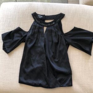Bebe black top, size extra small.